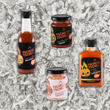 Grill & Burger Buddies set with Kohlenstoff grill sauce, Wilder Osten chilli sauce, Gurkerlfee relish and Flammenmeer chilli salt